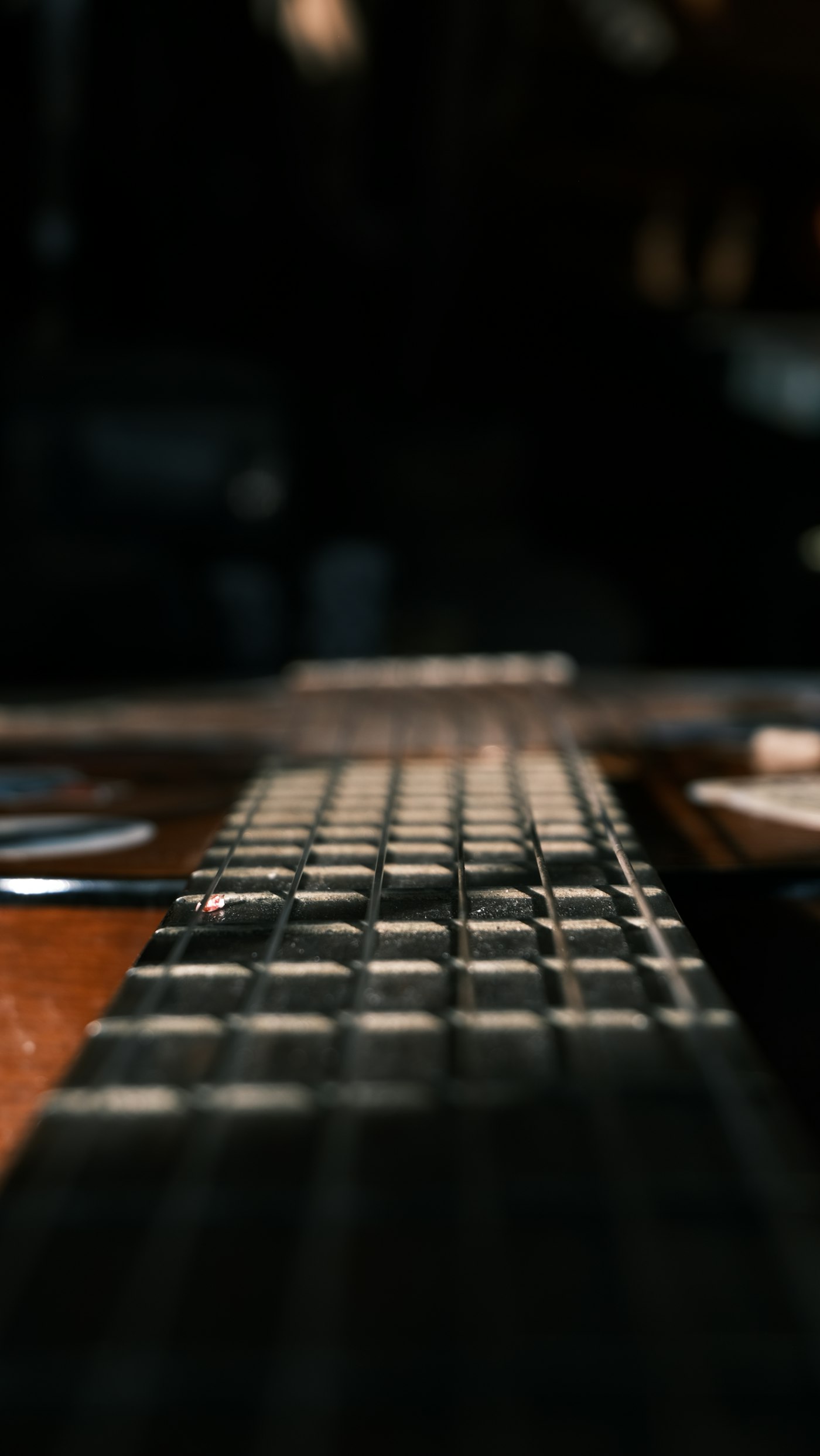 Close-up of a guitar fretboard