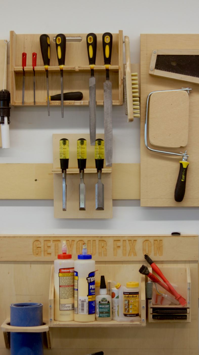 Workbench with hand tools on the wall
